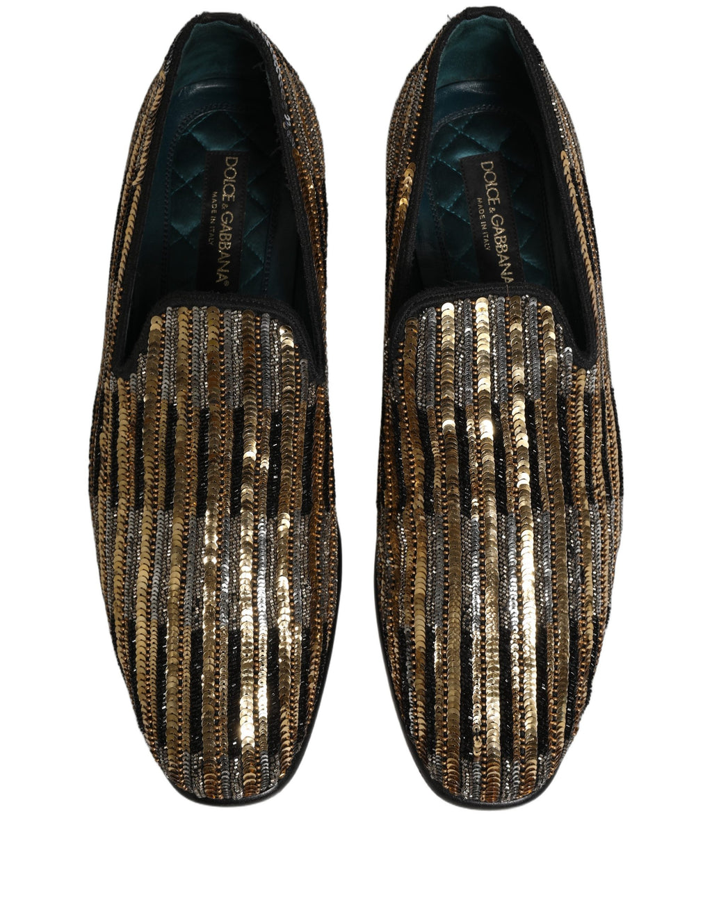 Chaussures loafers Dolce & Gabbana en sequins dorés à rayures, ornées de détails embellis, vue de face sur fond neutre.