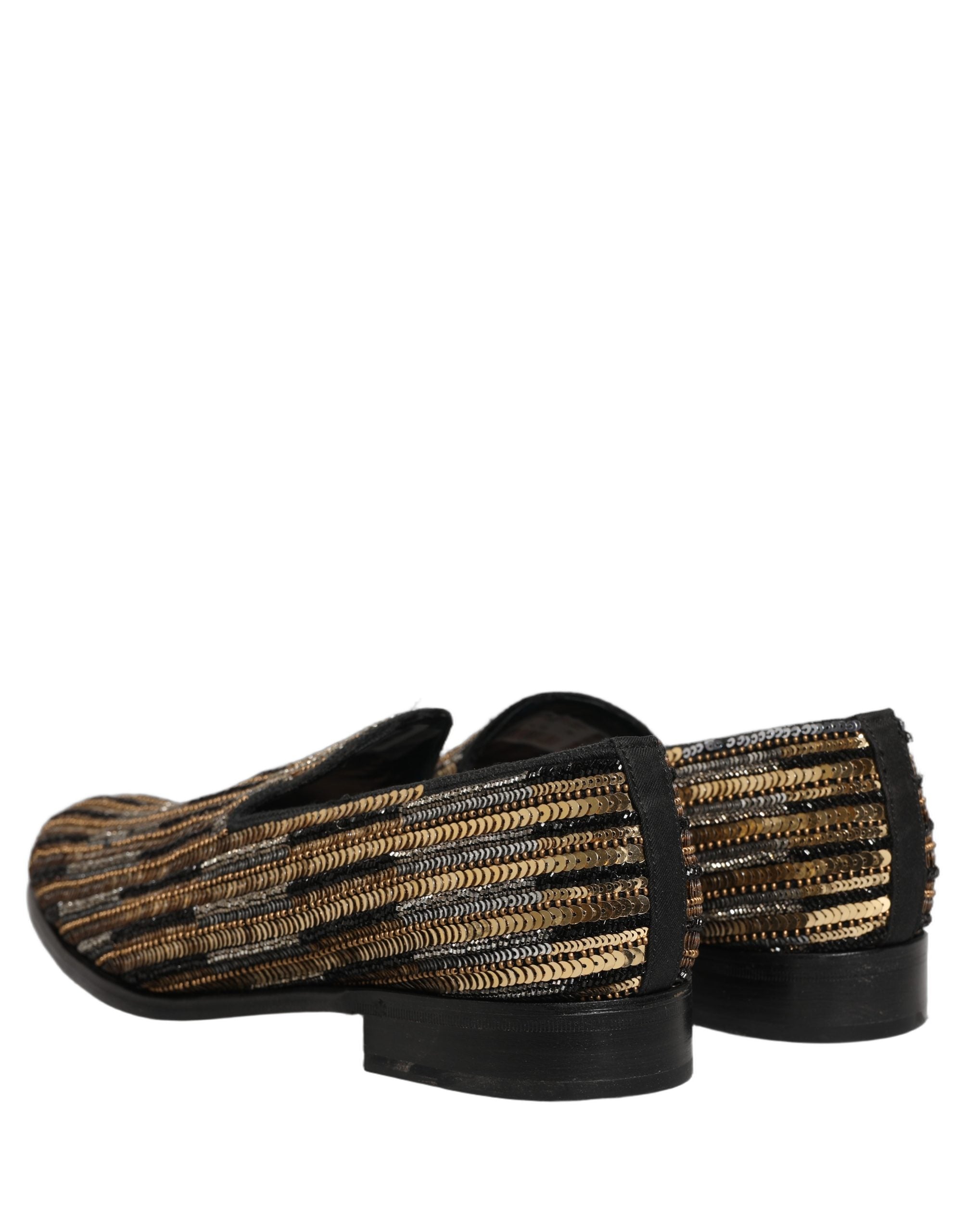 Chaussures mocassins Dolce & Gabbana en sequins dorés à rayures, embellies pour un style élégant et sophistiqué.