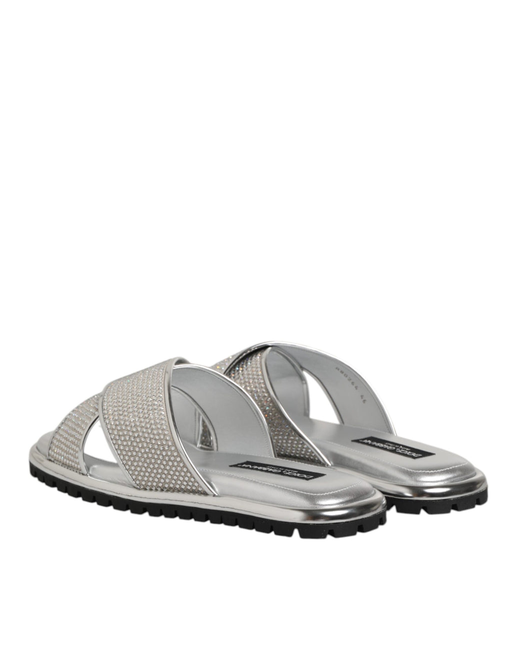 Sandales plates Dolce & Gabbana en strass argenté, chaussures élégantes pour femmes, avec semelle confortable et design brillant.