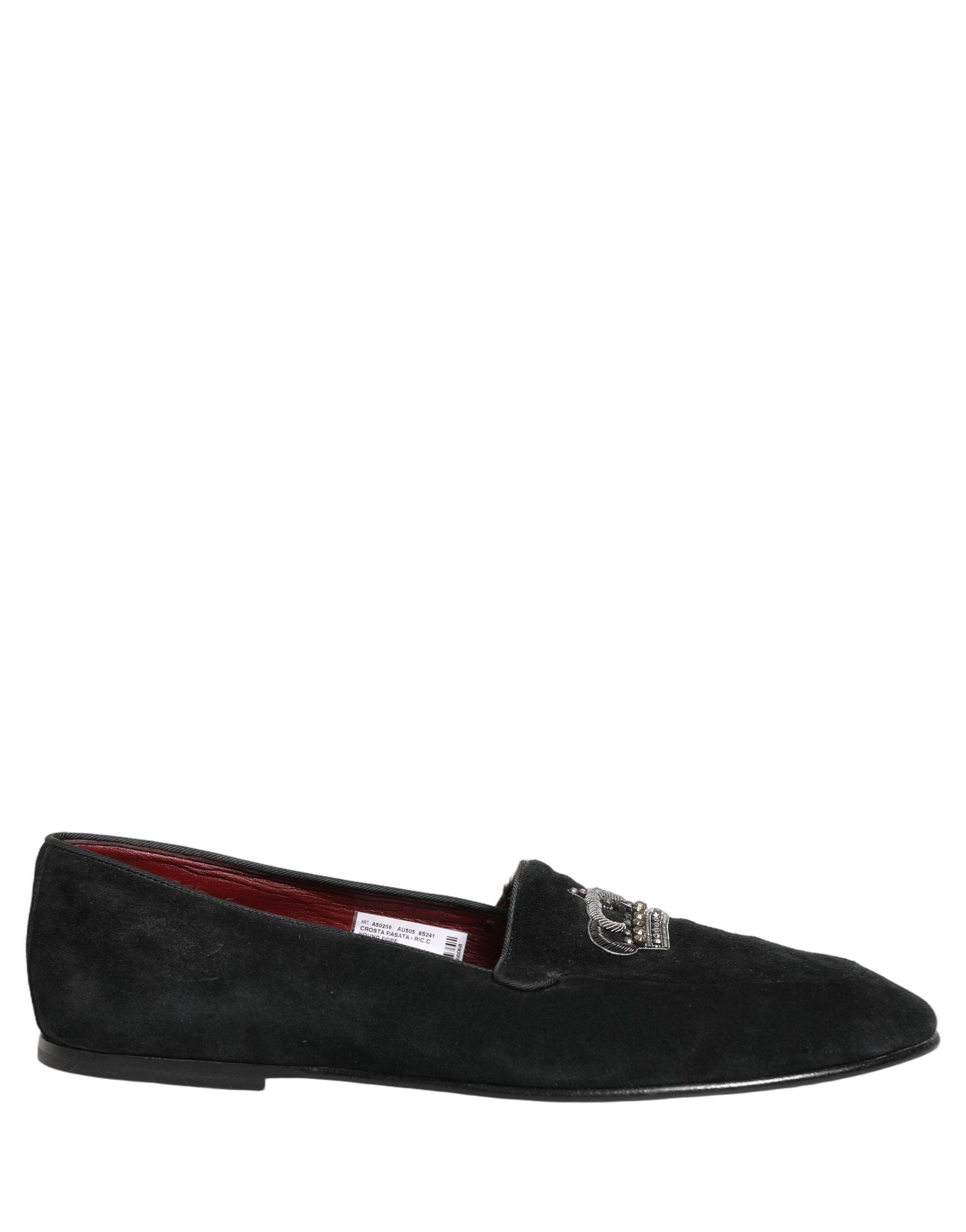 Chaussures loafers Dolce & Gabbana noires avec couronne ornée, élégantes et sophistiquées, vues de face sur fond blanc.