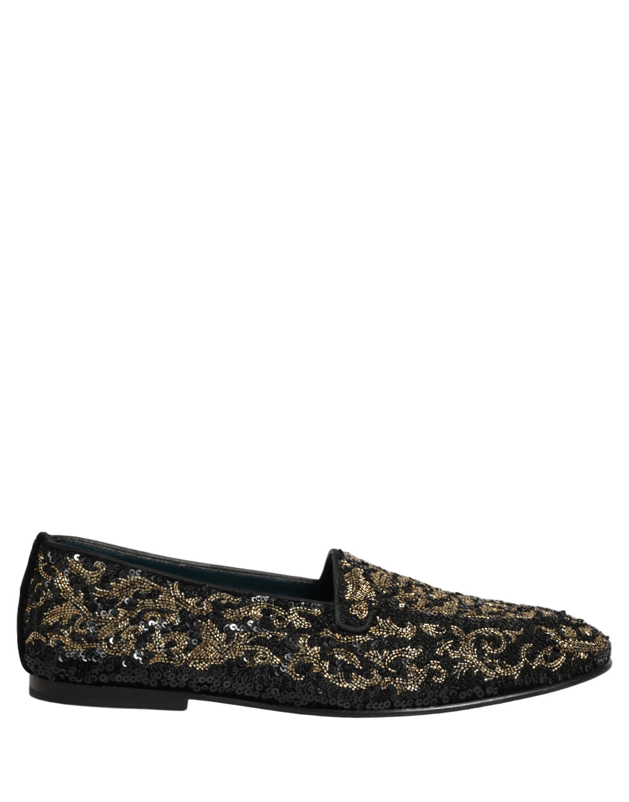 Derbies Dolce & Gabbana noires ornées de détails dorés et embellissements, en cuir élégant, visibles sur l’image.