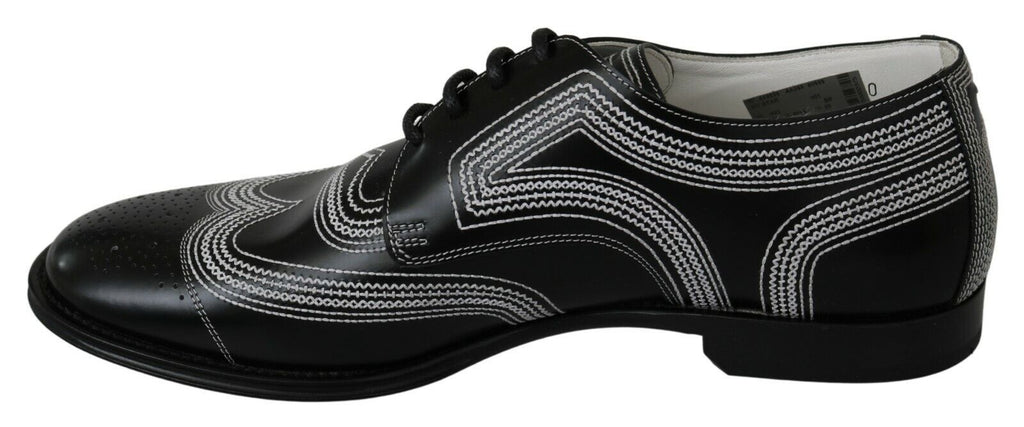 Chaussures Derby noires en cuir Dolce & Gabbana avec lacets blancs pour homme, élégantes et formelles.