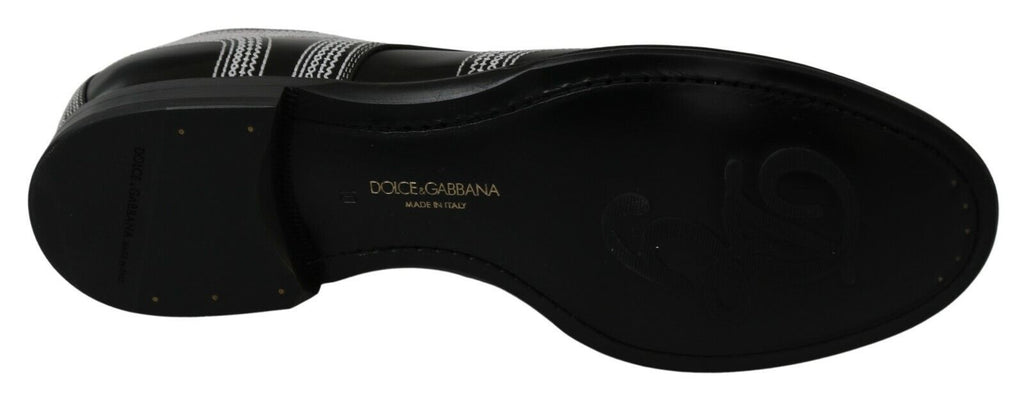 Chaussures derby en cuir noir Dolce & Gabbana avec lacets blancs pour homme, élégantes et formelles.