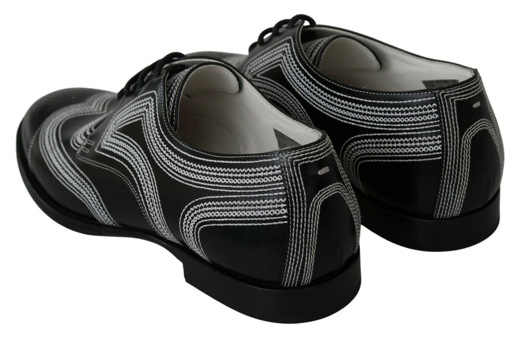 Chaussures Derby noires en cuir Dolce & Gabbana avec lacets blancs, élégantes et formelles pour homme.