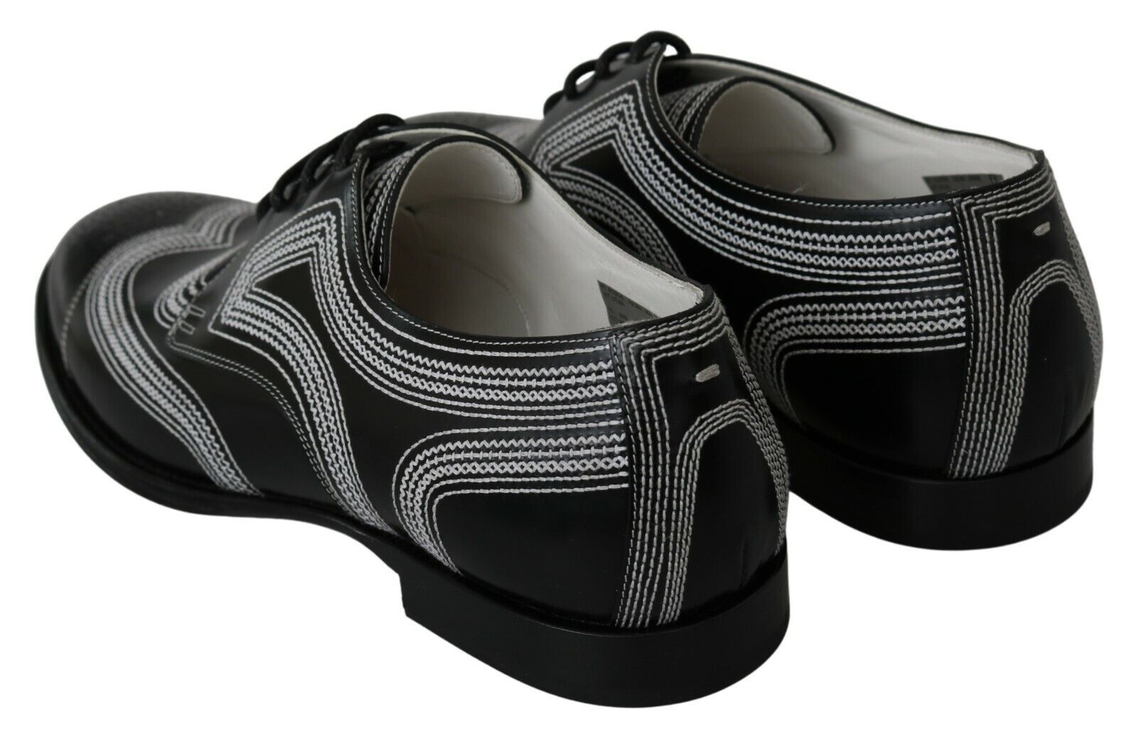 Chaussures Derby noires en cuir Dolce & Gabbana avec lacets blancs, élégantes et formelles pour homme.