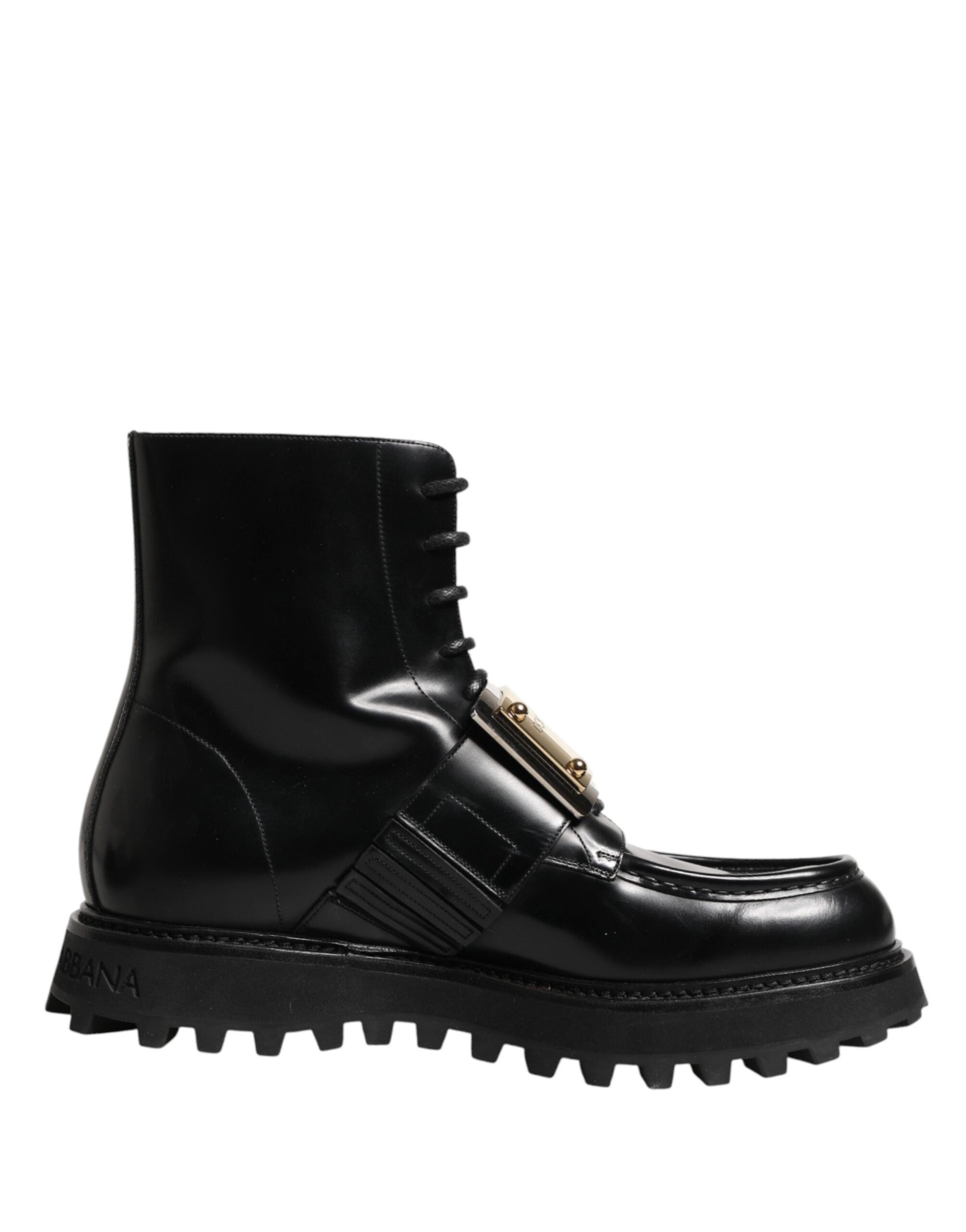 Bottes noires en cuir Dolce & Gabbana avec plaque DG, lacets et semelle robuste, pour un style élégant et sophistiqué.