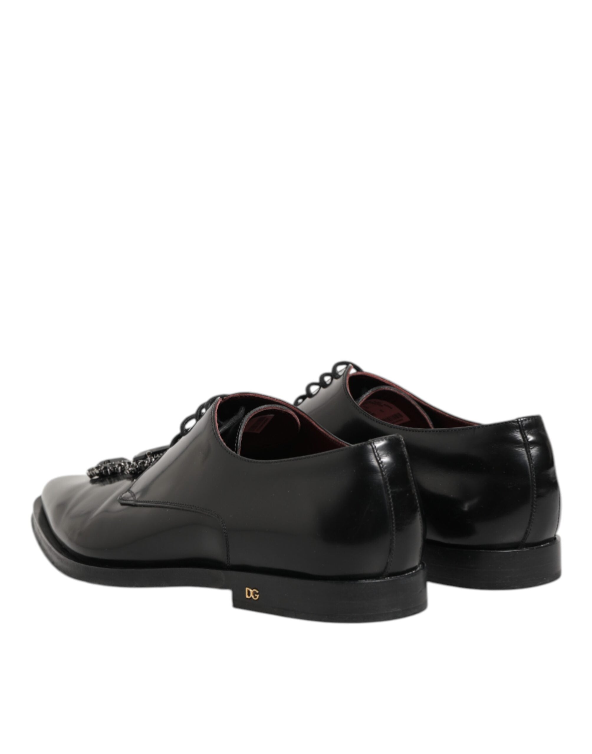 Chaussures derby en cuir noir Dolce & Gabbana ornées de bijoux et de cristaux, style élégant et sophistiqué.