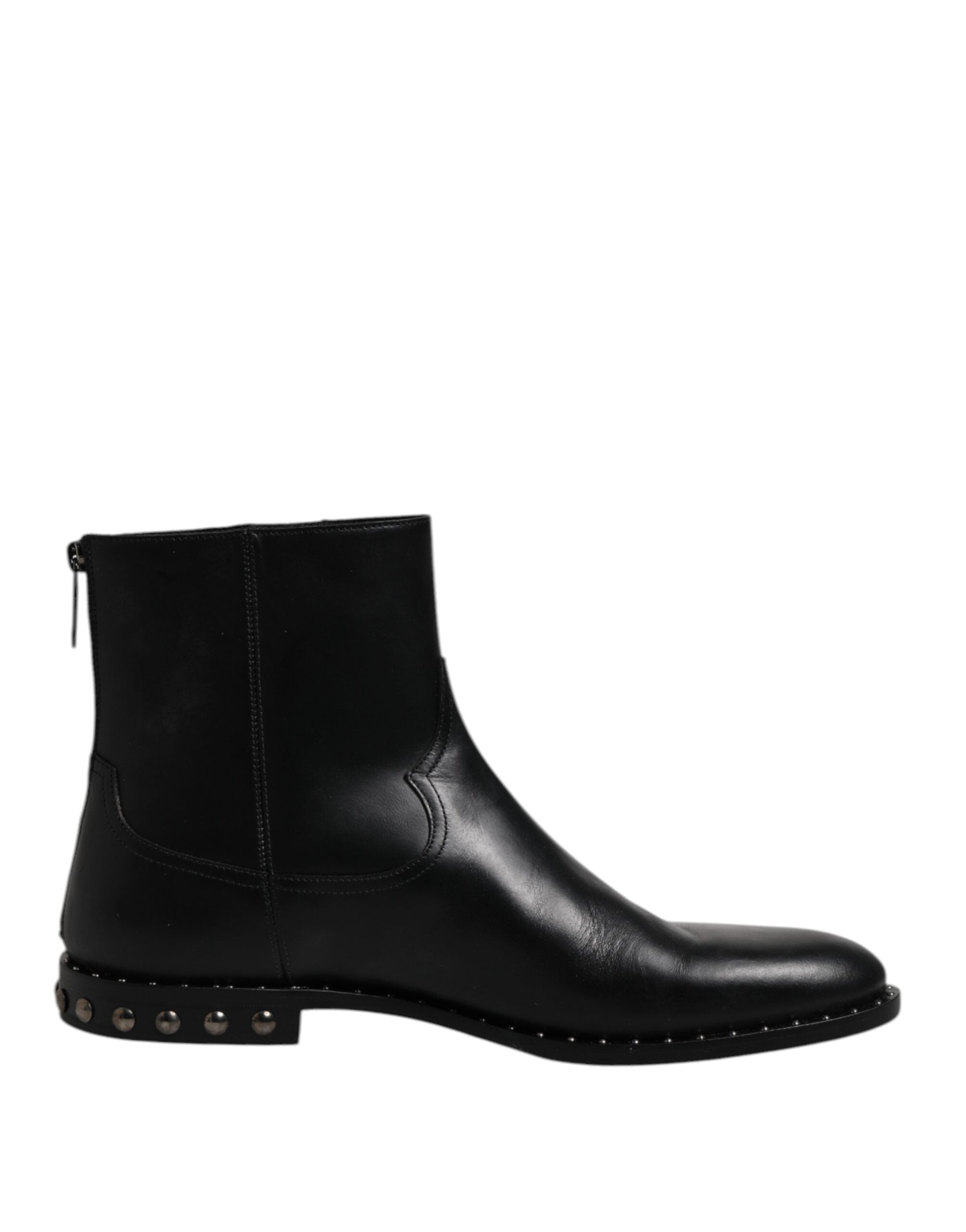 Chaussures bottines en cuir noir Dolce & Gabbana avec logo, clous décoratifs et semelle en cuir, vue de profil.