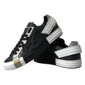 Chaussures sneakers basses en cuir noir Dolce & Gabbana Portofino, vue de face.