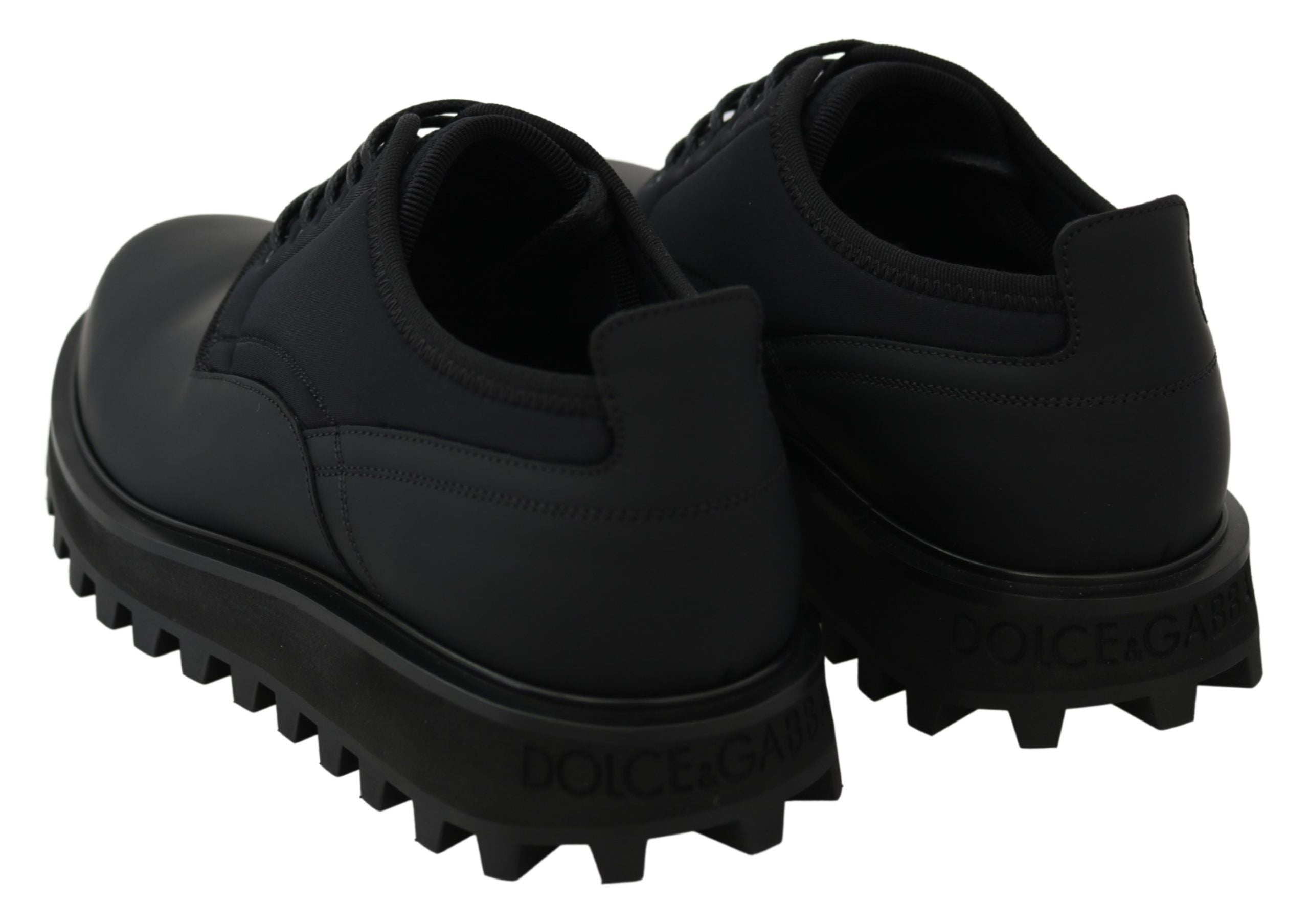 Chaussures Derby chunky en caoutchouc noir en cuir de veau de Dolce & Gabbana, style robuste et moderne.