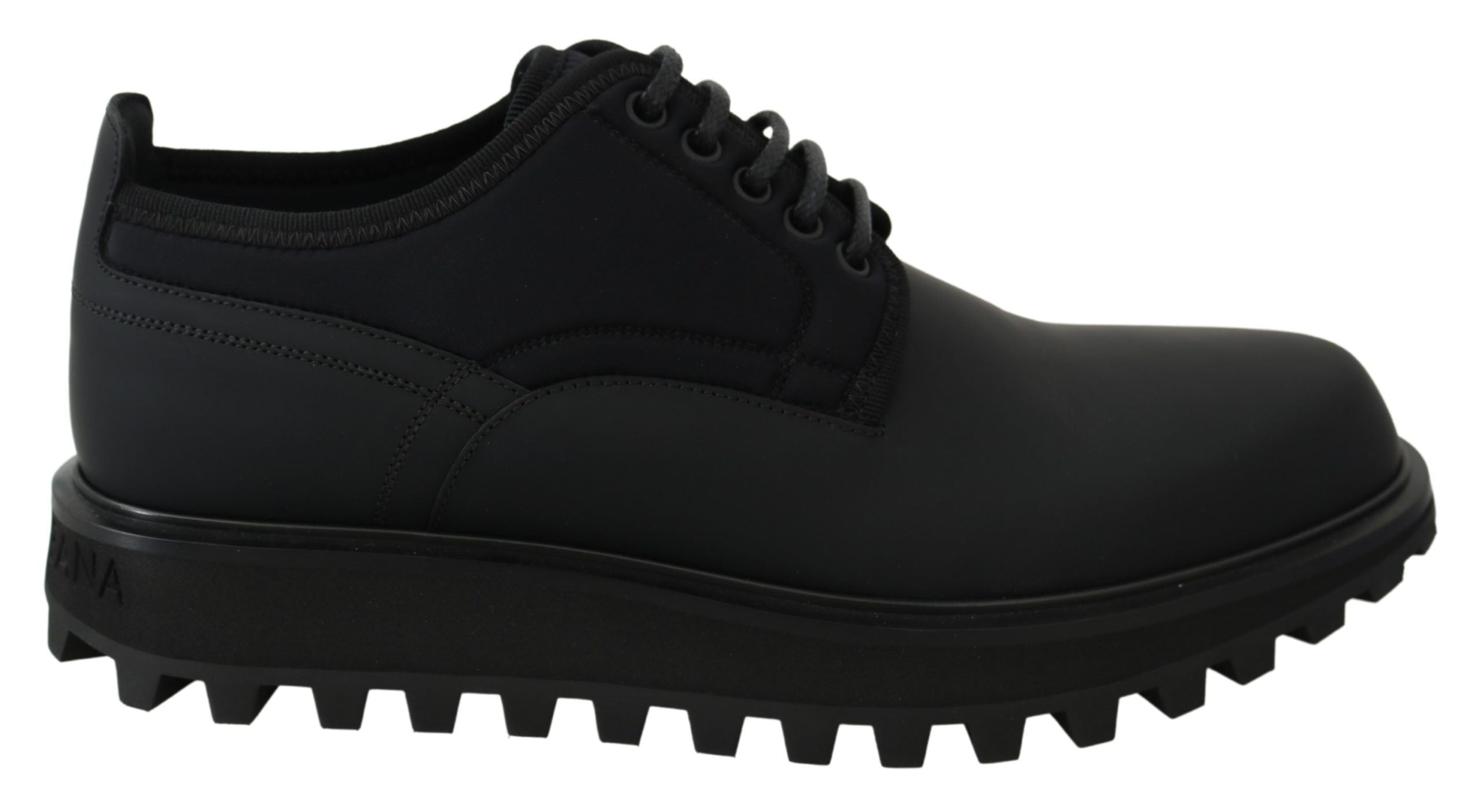 Chaussures derby Dolce & Gabbana en caoutchouc noir et cuir de veau, style chunky et vulcano, vue de face.