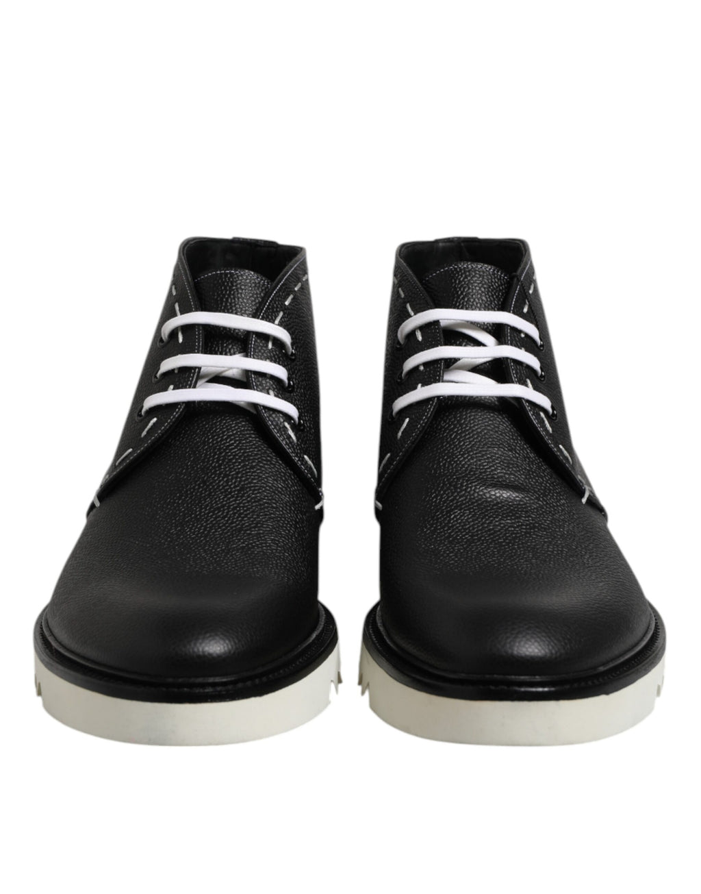 Bottes ankle en cuir noir et blanc de Dolce & Gabbana, chaussures élégantes avec détails sophistiqués.