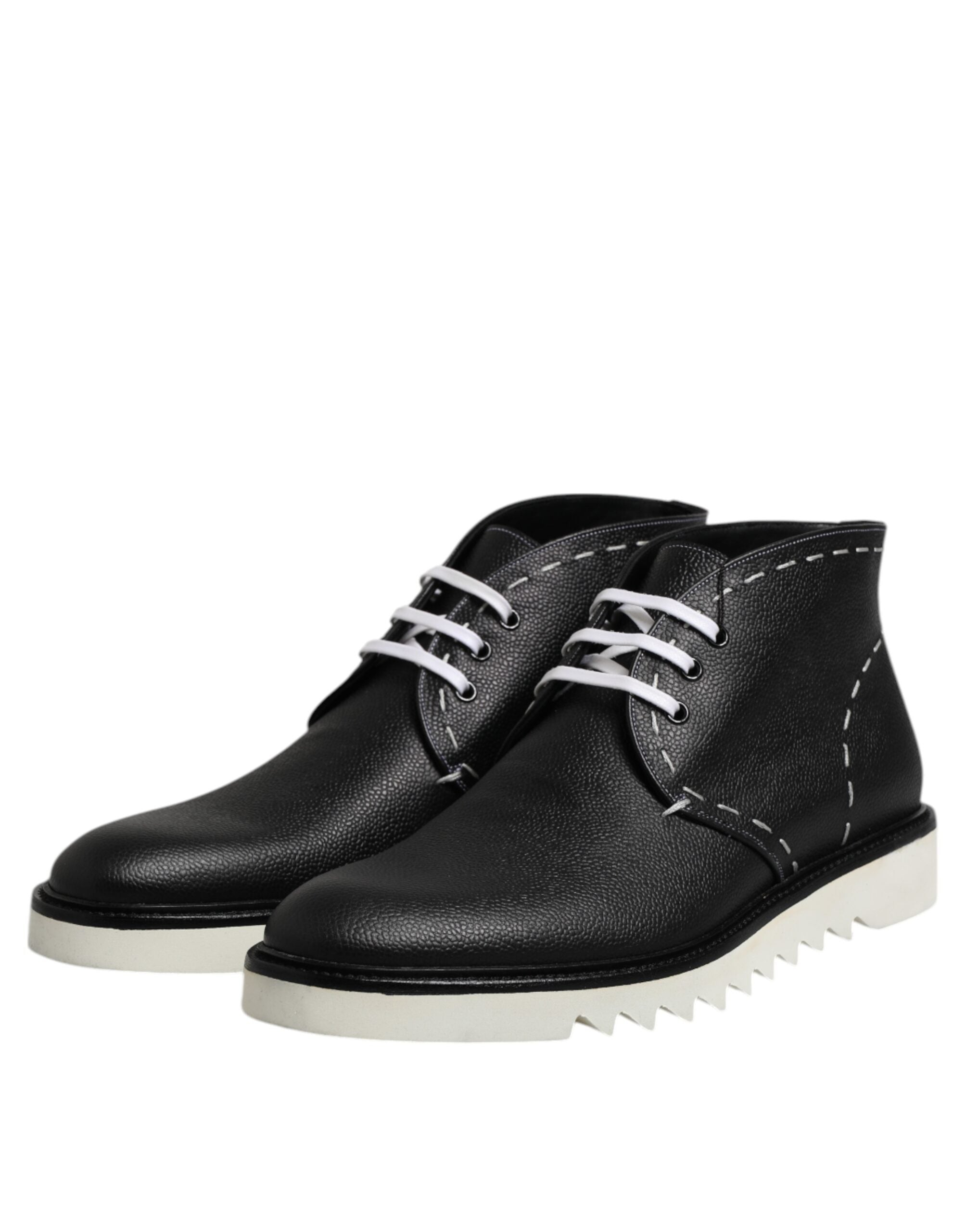Bottes ankle en cuir noir et blanc de Dolce & Gabbana, chaussures élégantes pour femme, détails en cuir et design moderne.