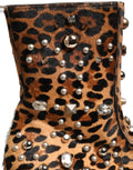 Bottes homme Dolce & Gabbana marron à motif léopard avec embellissements, mi-mollet, chaussures élégantes et tendance.