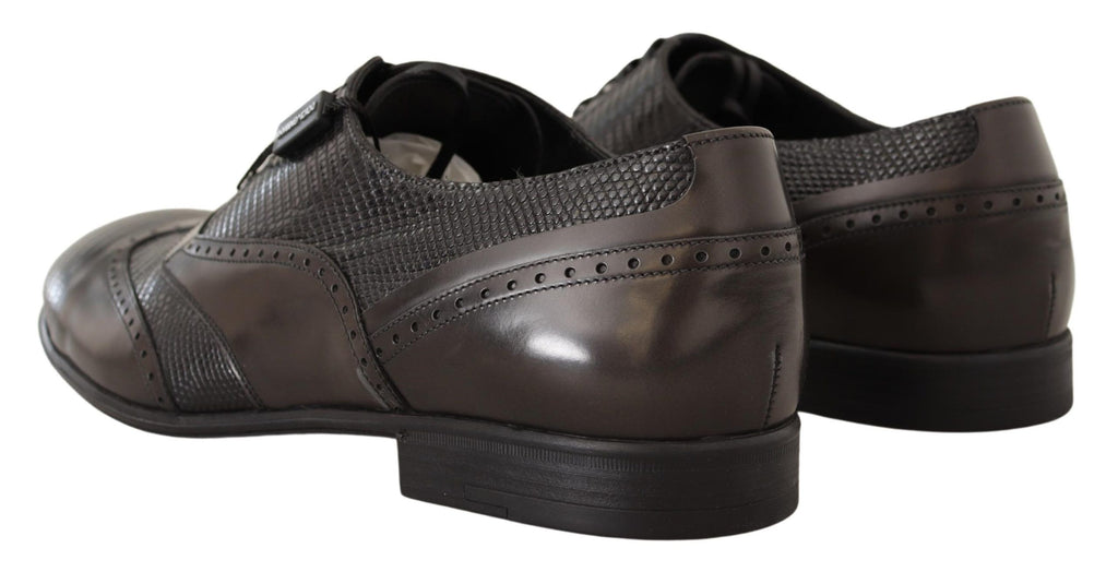 Chaussures Oxford en cuir de lézard brun Dolce & Gabbana, élégantes et sophistiquées, vues de côté avec détails de la texture du cuir.