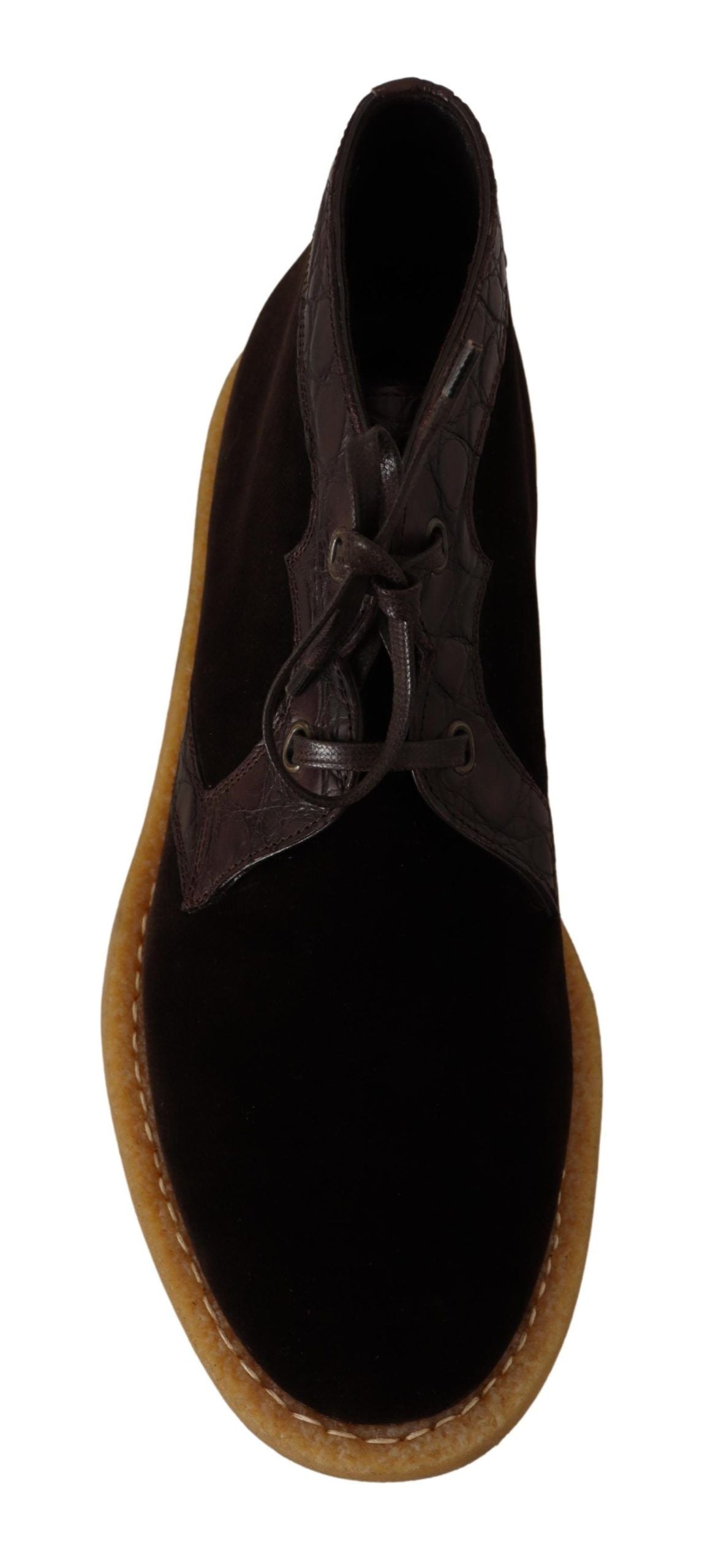 Bottes en velours marron Dolce & Gabbana en cuir exotique, élégantes et sophistiquées, visibles en gros plan.