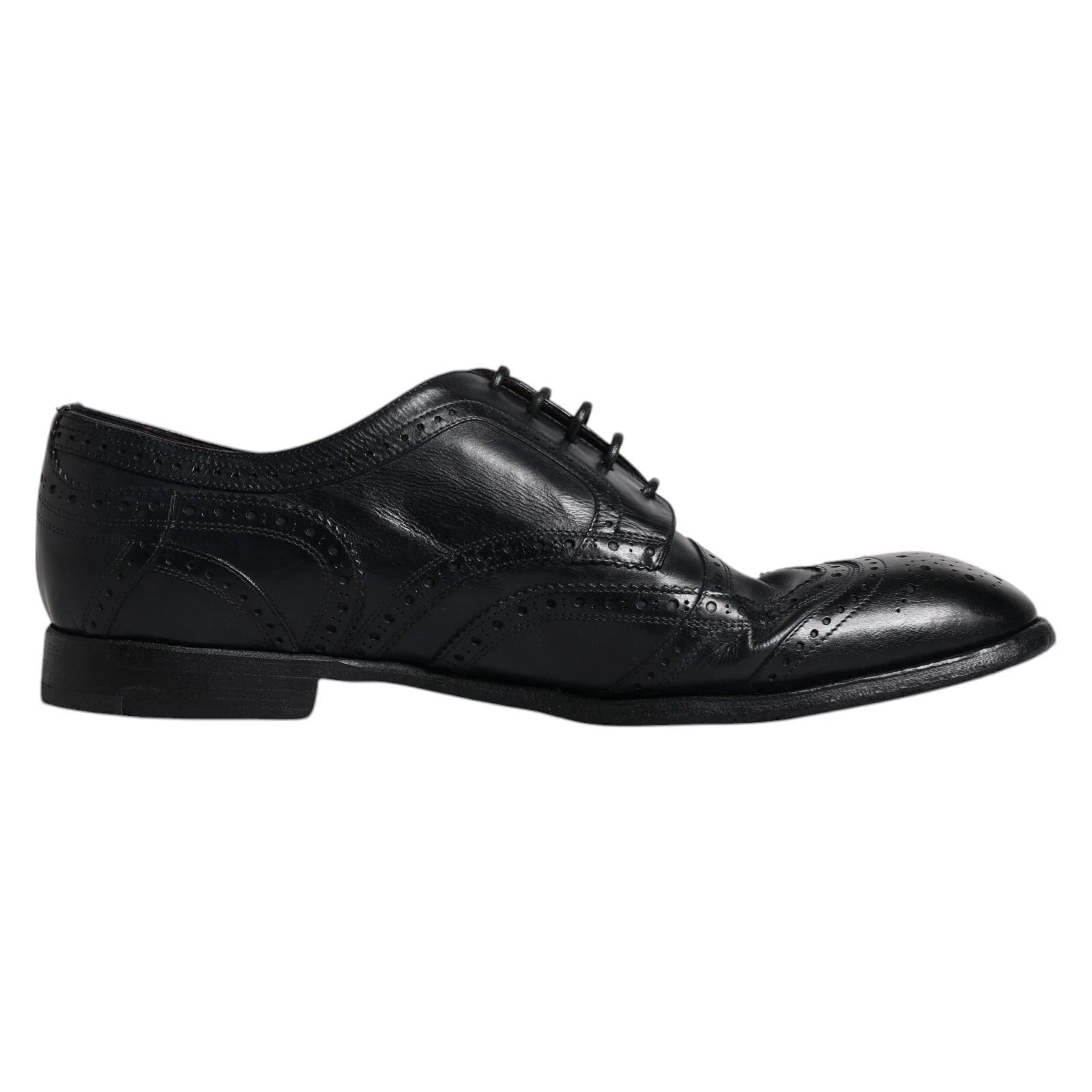 Chaussures derby en cuir bleu foncé Dolce & Gabbana, souliers formels wingtip avec détails élégants et finition raffinée.