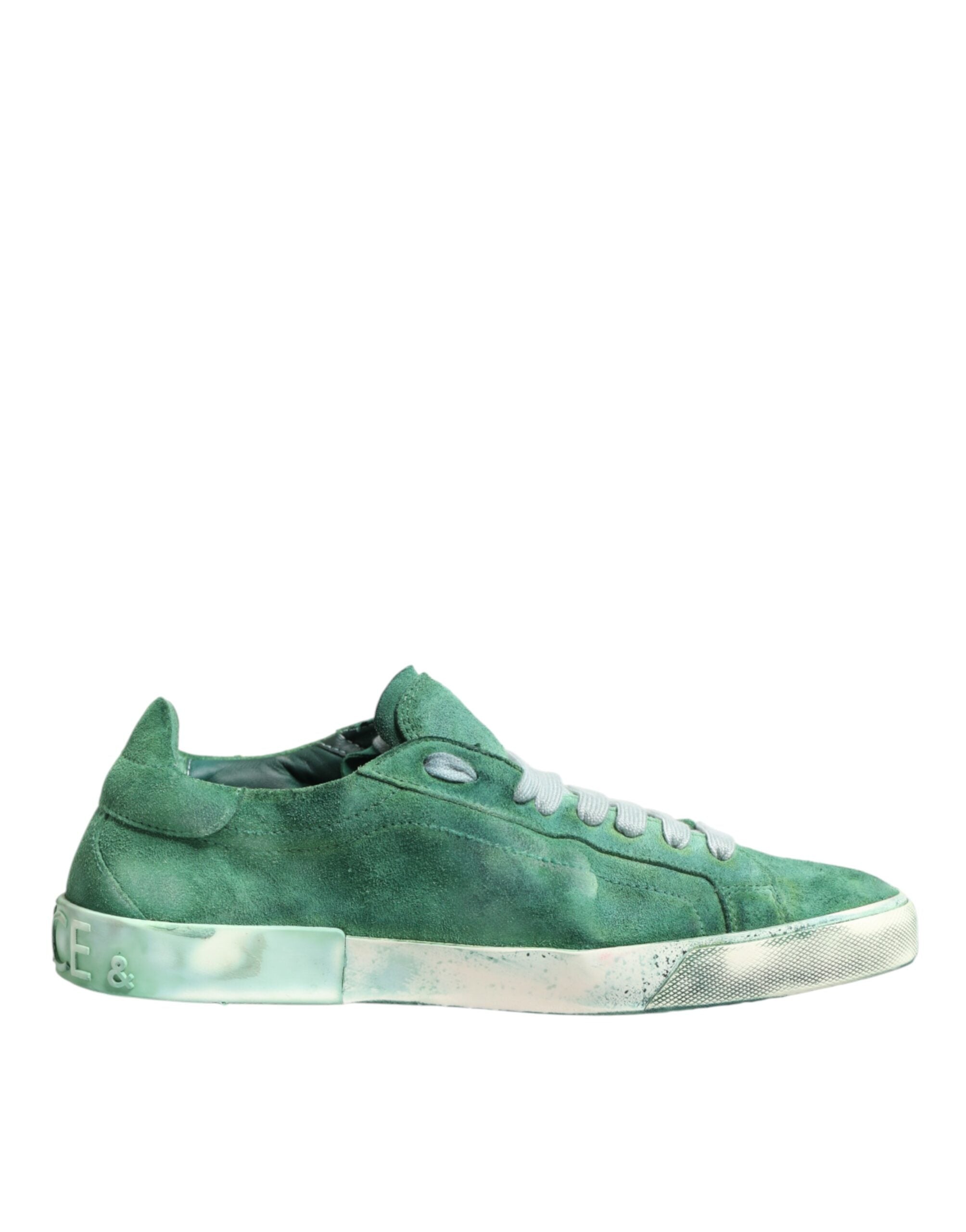 Chaussures sneakers basses Dolce & Gabbana en daim vert avec logo DG sur la semelle, vue de côté.