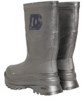 Bottes de pluie métalliques argentées Dolce & Gabbana pour homme, chaussures à enfiler avec finition brillante.