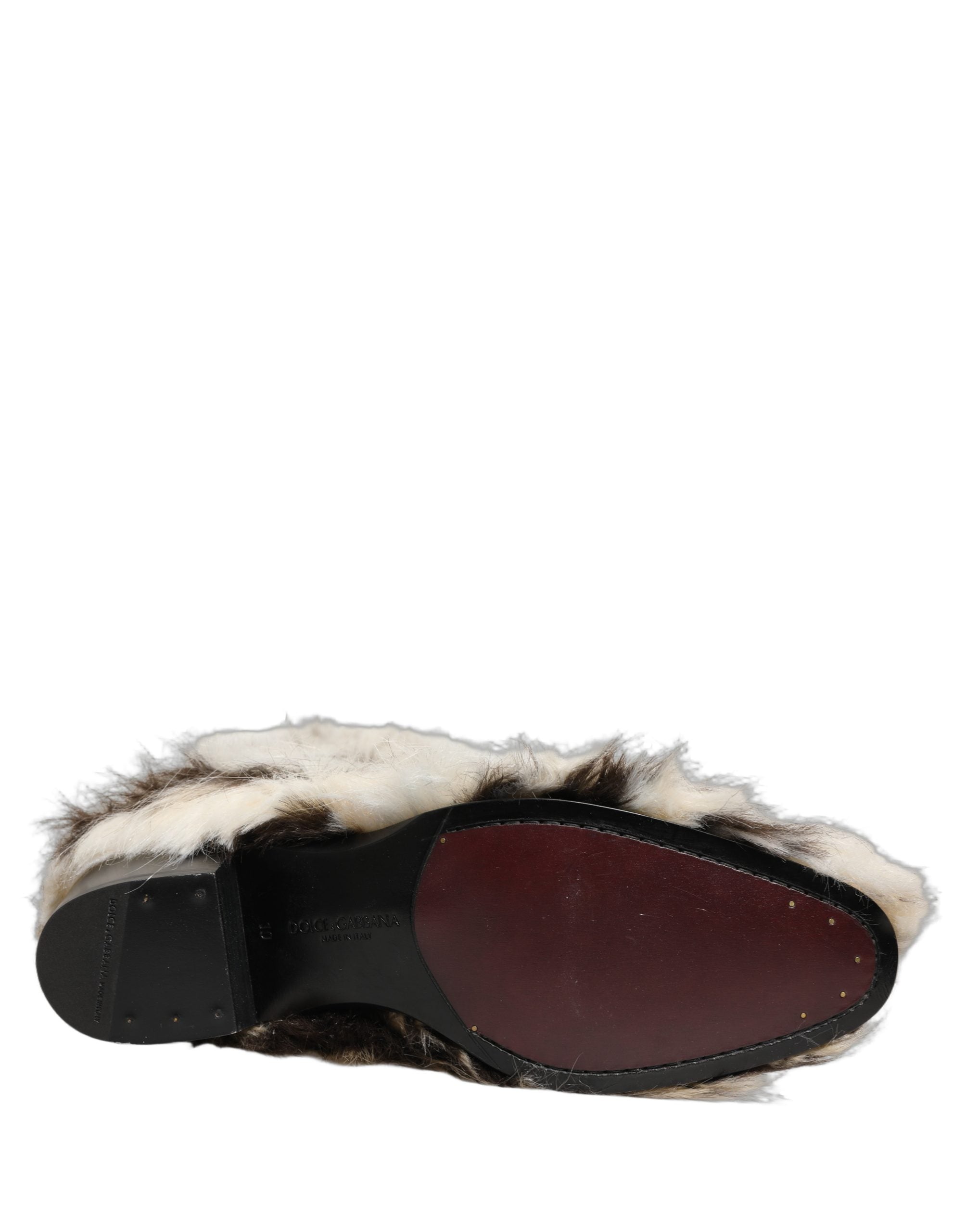 Bottes hautes en fausse fourrure multicolore Dolce & Gabbana, chaussures élégantes et tendance, vues de face.