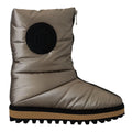 Bottes ankle en polyester argenté de Dolce & Gabbana, style élégant avec finition brillante et semelle noire.