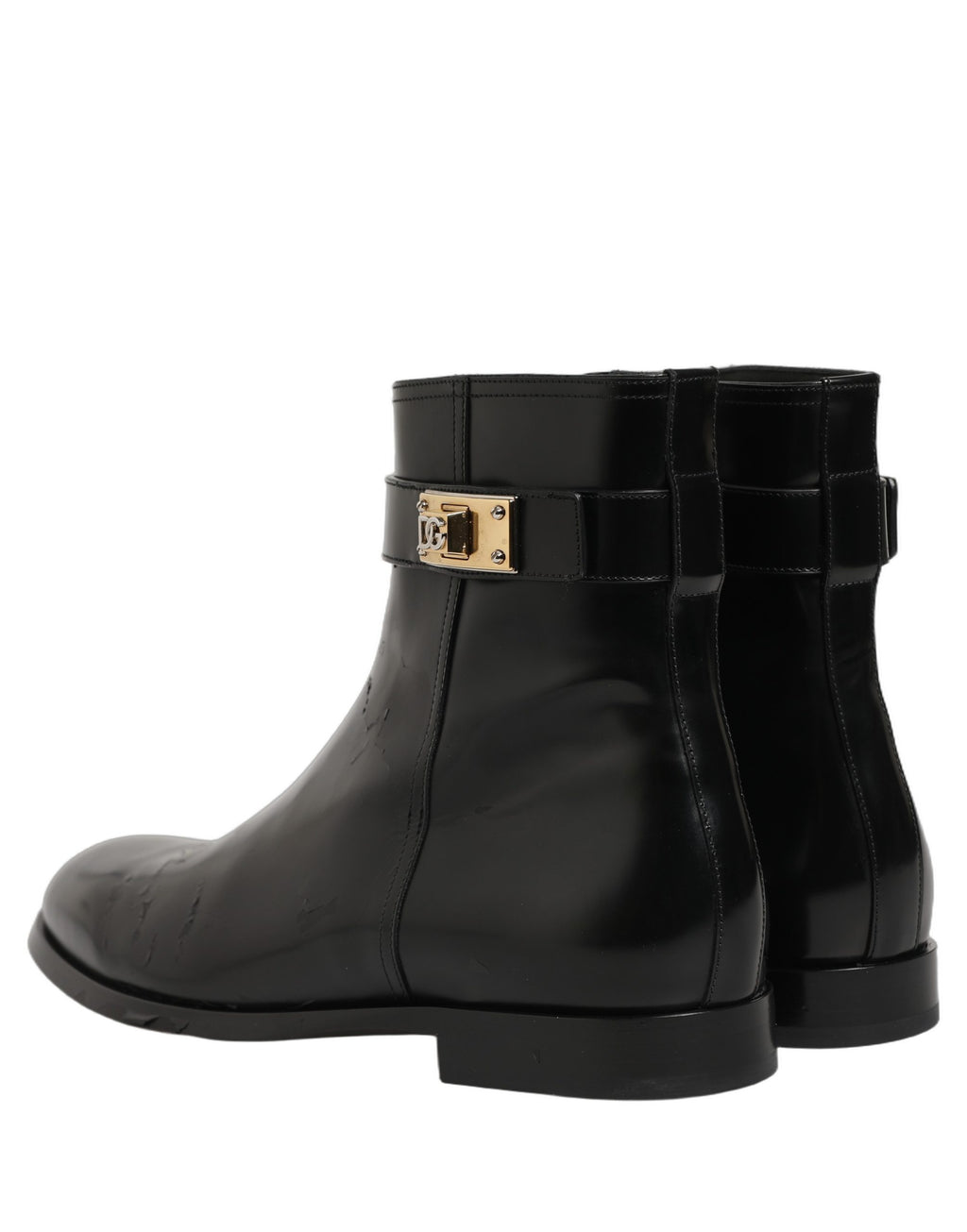 Bottes en cuir noir Dolce & Gabbana avec boucle logo, mi-mollet, pour homme, style élégant et sophistiqué.