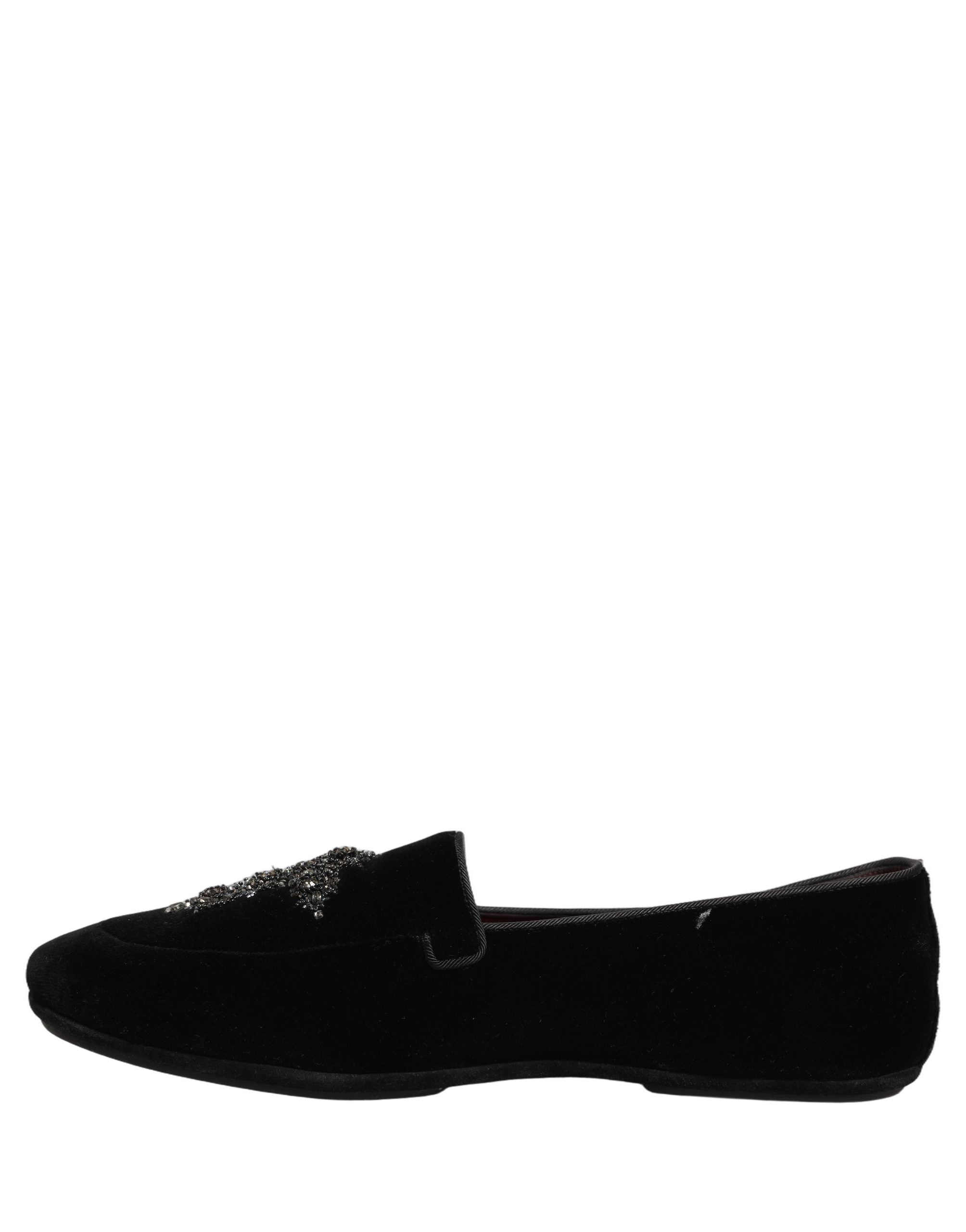 Chaussures Dolce & Gabbana mocassins en daim noir ornés de détails embellis, élégantes et sophistiquées pour femmes.
