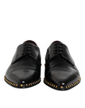 Chaussures derby en cuir noir Dolce & Gabbana pour hommes avec studs, élégantes et sophistiquées.