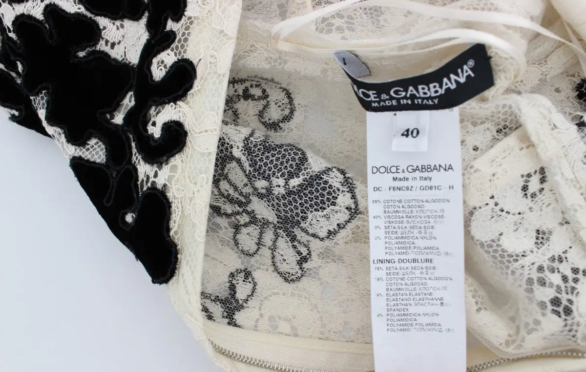 Robe longue de bal en dentelle crème avec appliqués floraux noirs de dolce & gabbana