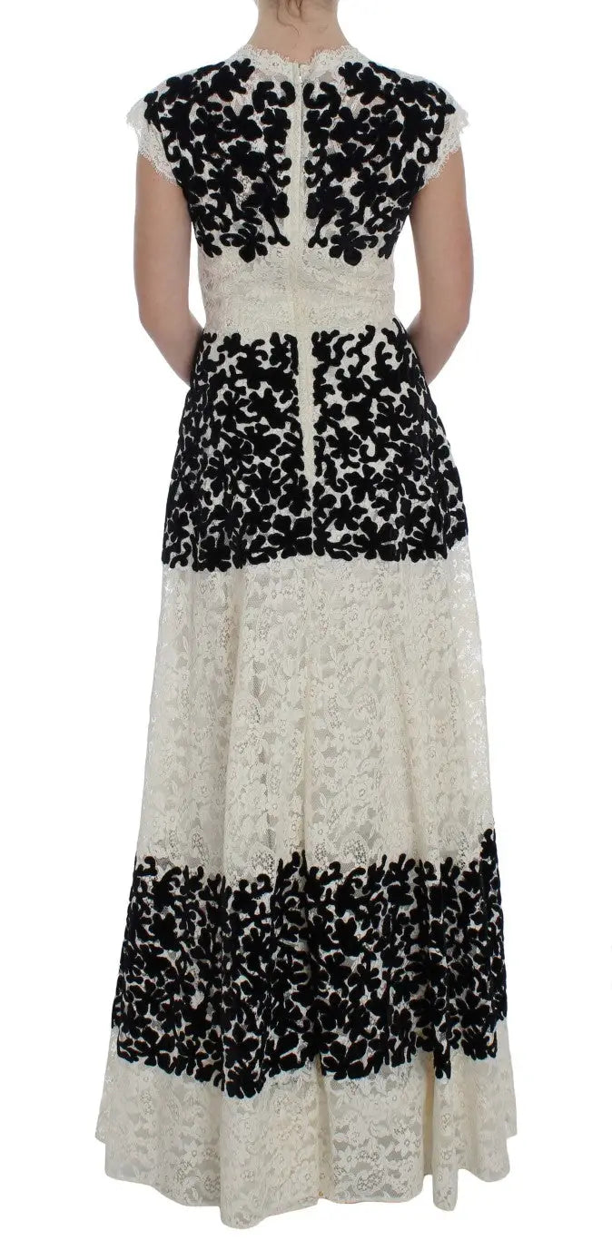Robe longue de bal dolce gabbana en dentelle florale noire et blanche avec corsage ajusté manches courtes et jupe à volants