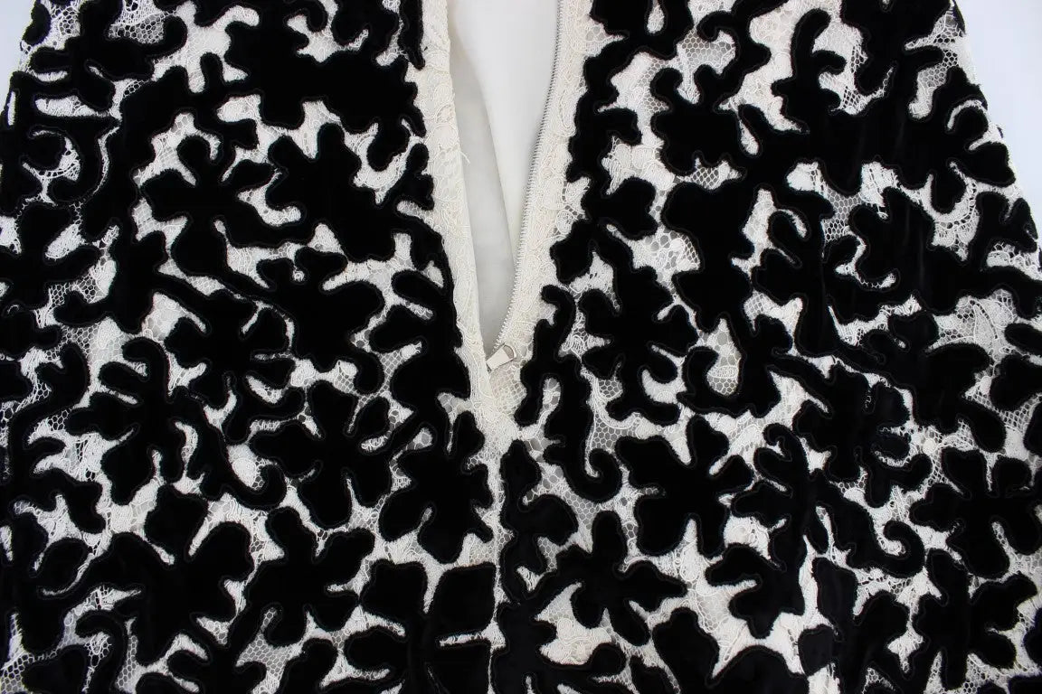 Robe longue maxi noire et blanche en dentelle florale avec applications veloutées dolce gabbana