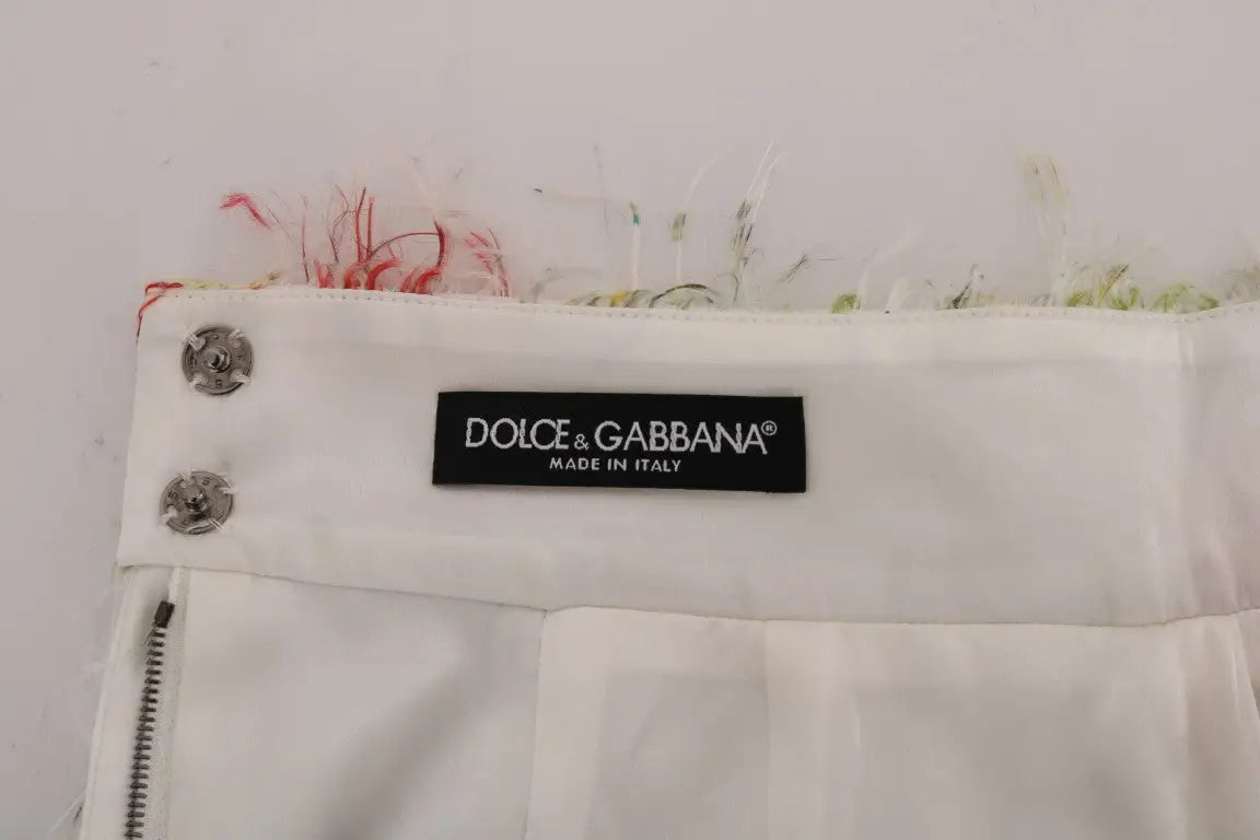 Pantalon taille haute blanc dolce & gabbana avec ourlet effiloché multicolore et boutons argentés, jupe crayon motif floral