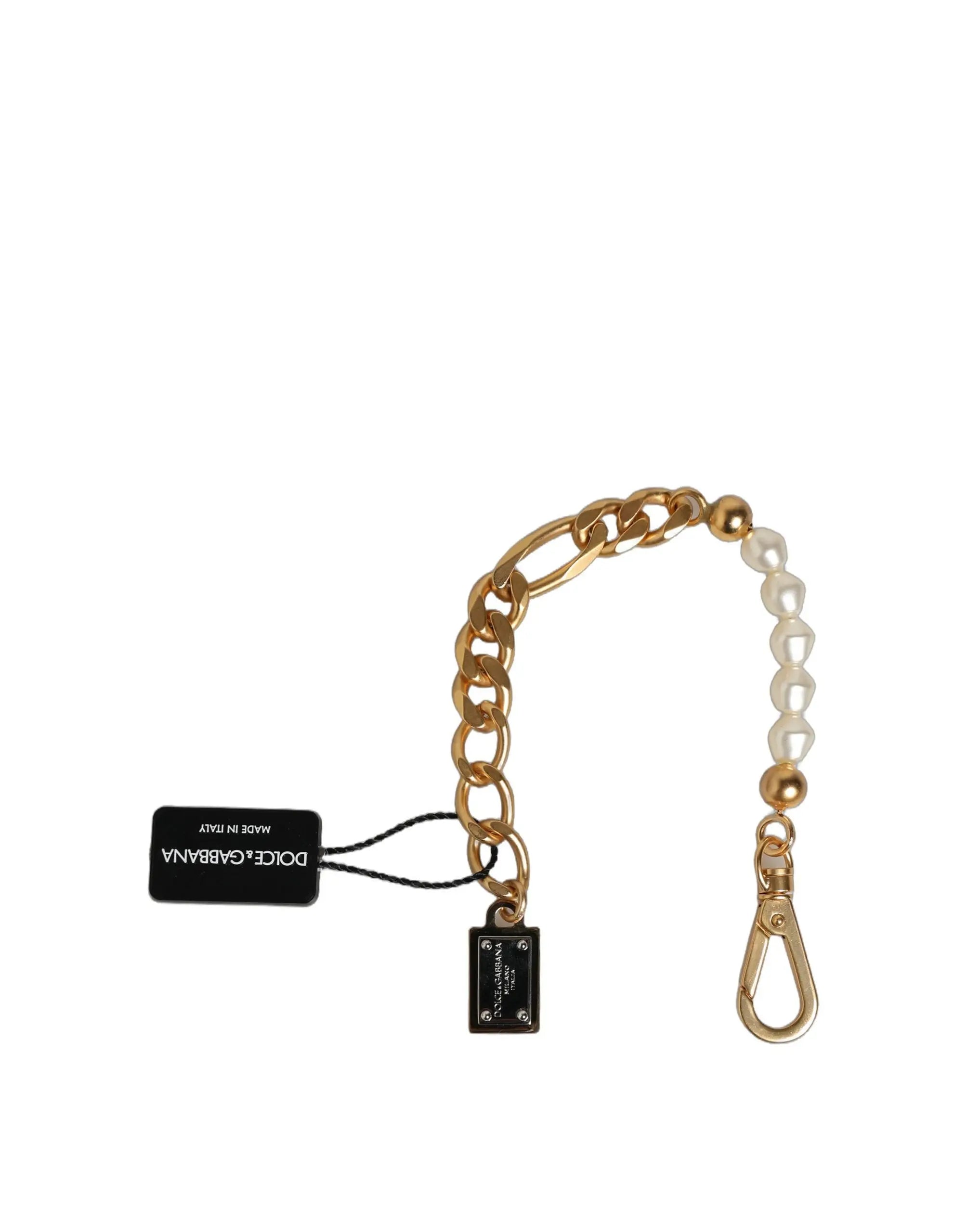 Bracelet dolce & gabbana en laiton doré avec chaîne ornée de perles blanches et plaque noire marque