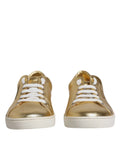 Baskets basses hommes dolce & gabbana en cuir or métallisé avec lacets blancs et design minimaliste propre