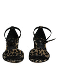 Sandales à talons noirs et or dolce & gabbana imprimé léopard avec design élégant à lanières