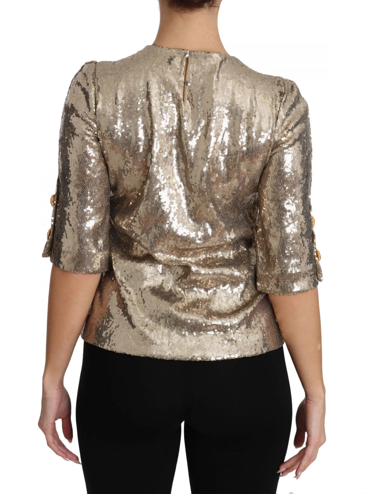 Blouse dolce & gabbana en sequins dorés avec manches trois quarts et boutons décoratifs aux poignets