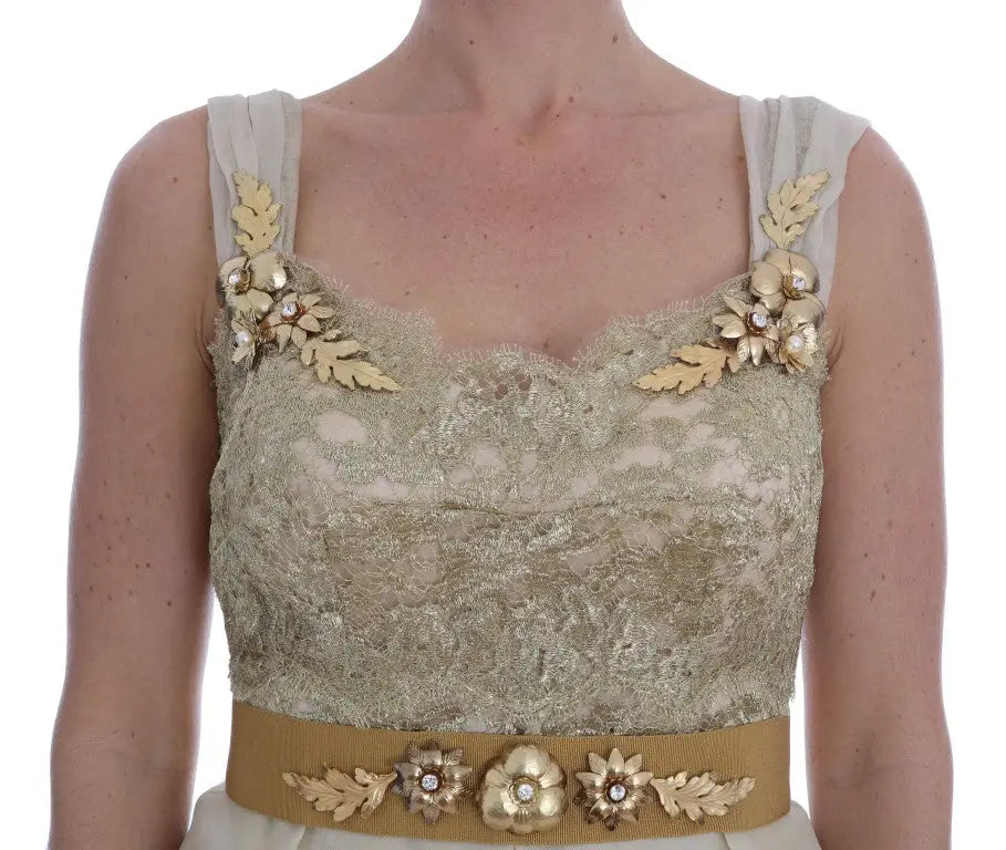 Délicat top en dentelle doré avec embellissements floraux et ceinture assortie sur robe en soie crystal dolce & gabbana