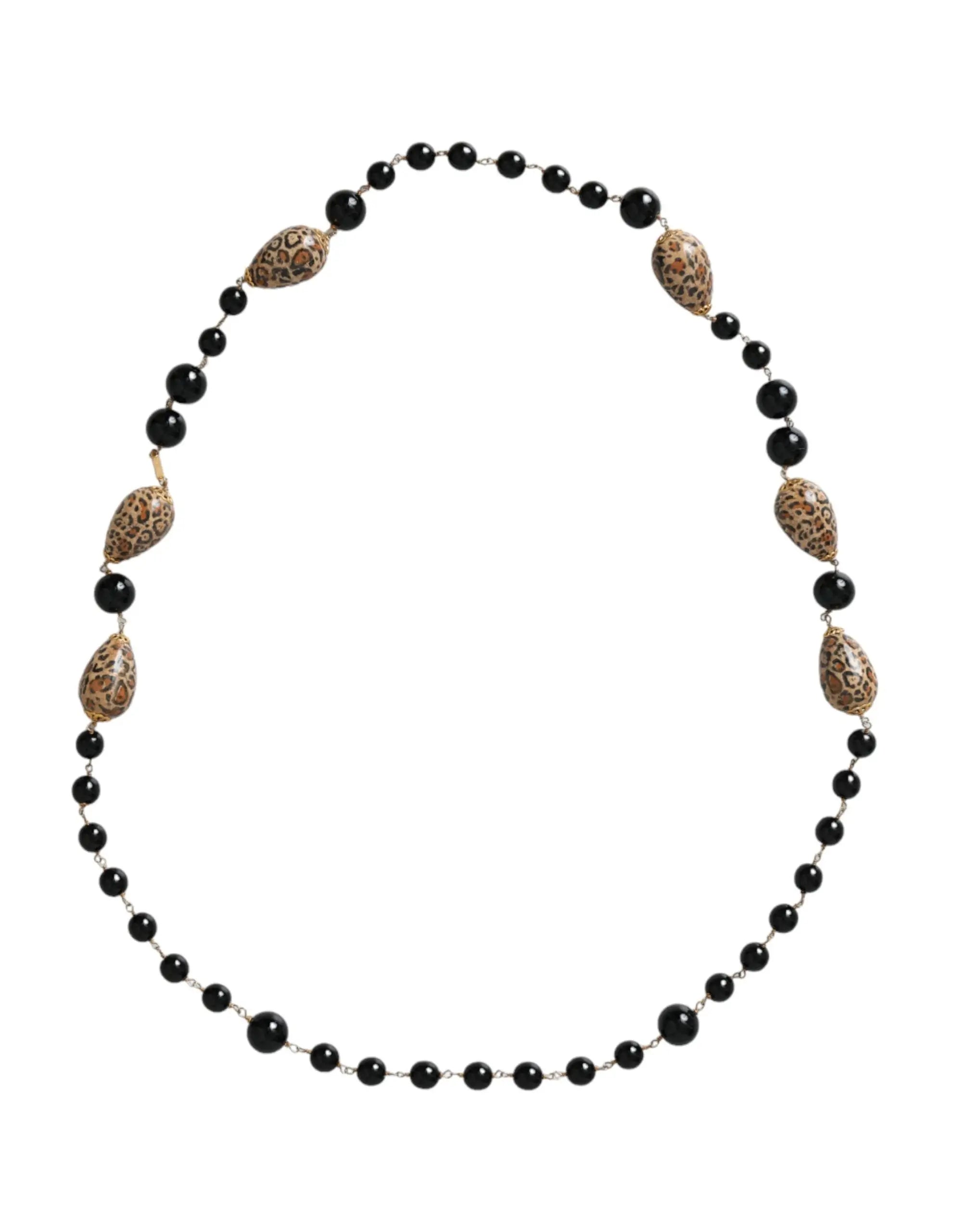 Collier long en laiton doré dolce & gabbana à perles noires imprimé léopard avec perles rondes et en forme de goutte