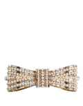 Boucle de ceinture en laiton doré dolce & gabbana en forme de noeud ornée de perles crème et cristaux baguette transparents