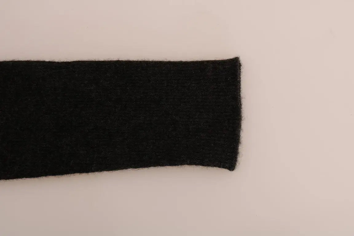 Une bande de tissu en maille noire élégante avec une surface douce et texturée pour des collants dolce & gabbana en cachemire gris côtelé extensible
