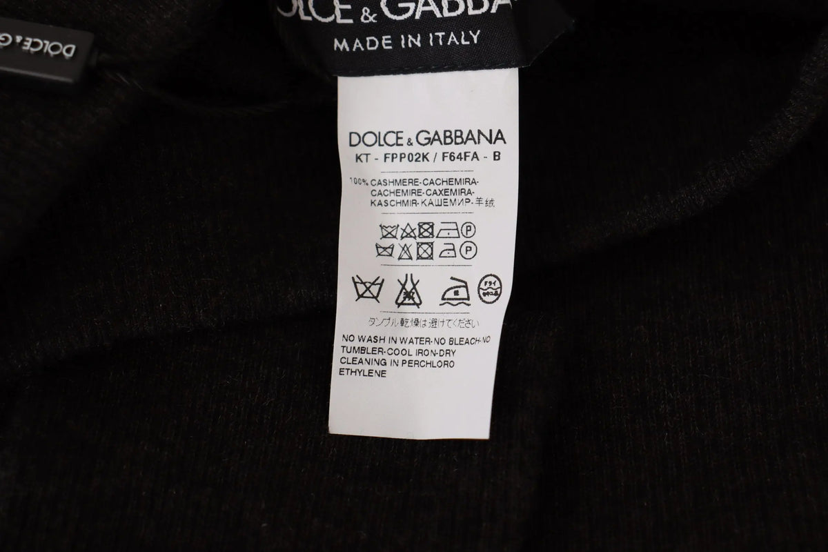 Étiquette noire dolce & gabbana en cachemire avec texte blanc et instructions d entretien sur collants gris en cachemire
