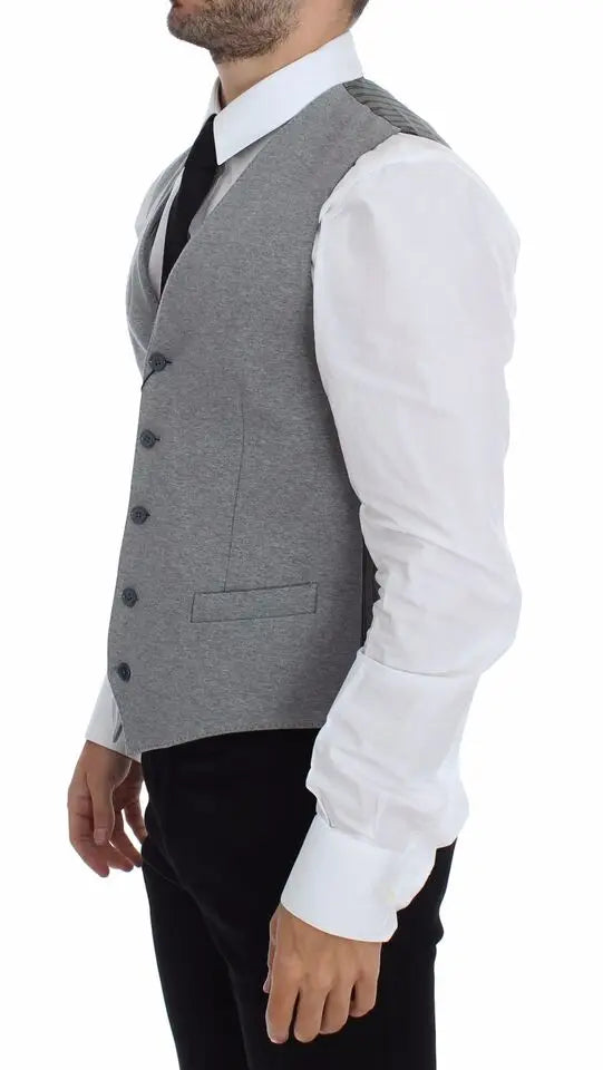 Gilet tailleur dolce gabbana gris en coton stretch avec boutons noirs et détails rayés subtils aux épaules