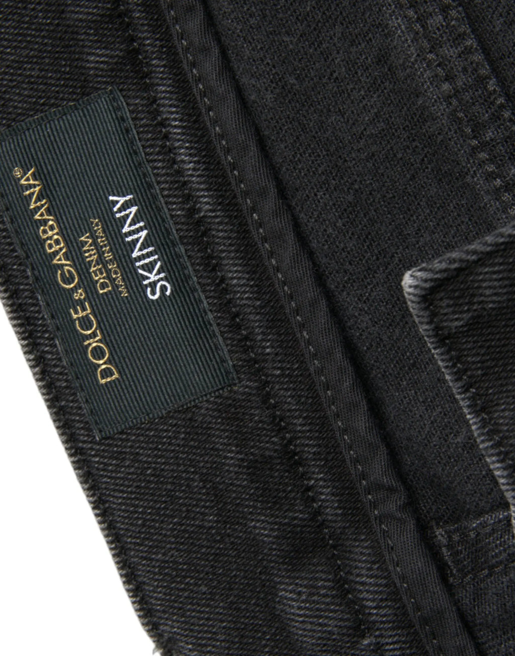 Jean skinny en denim stretch coton gris dolce & gabbana avec étiquette côtelée noire or et blanc