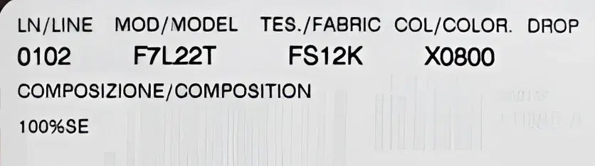 Étiquette du dos de blouse dolce & gabbana grise en soie 100 pour cent avec imprimé clé dorée