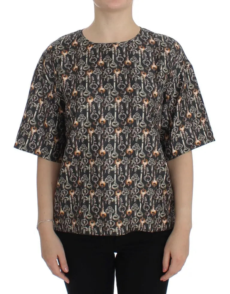 Top à manches courtes noir dolce & gabbana en soie avec motif clé vintage doré et argenté