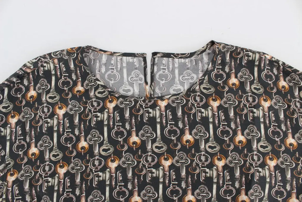 Blouse dolce & gabbana en soie noire avec imprimé clé vintage gris or métallisé