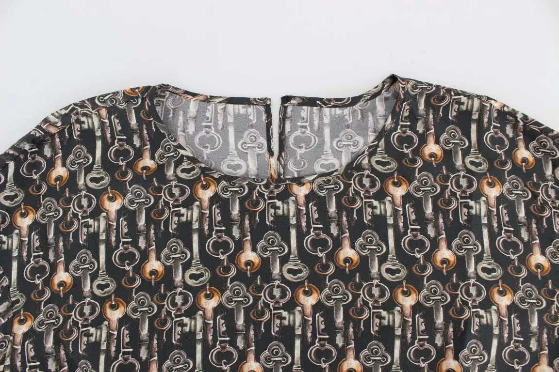 Blouse dolce & gabbana en soie noire avec imprimé clé vintage gris or métallisé