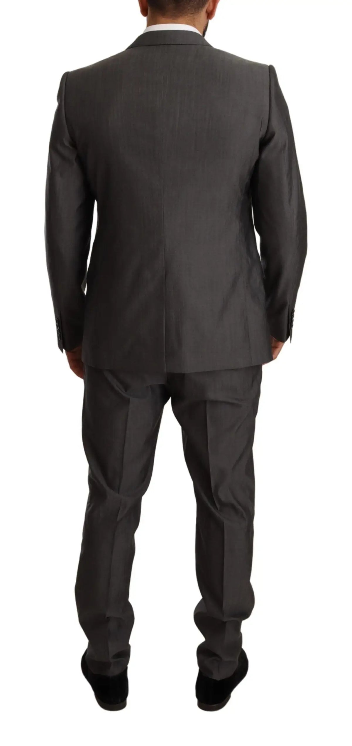 Un costume slim fit dolce & gabbana martini gris métallique en tissu texturé avec coupe ajustée et revers classiques