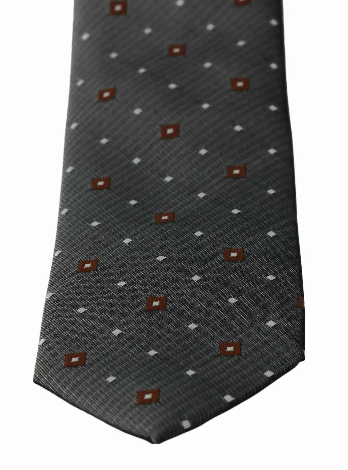 Cravate fine classique pour homme dolce & gabbana en soie grise foncée avec motif subtil de petits carrés bruns et losanges blancs