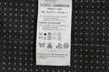Étiquette d entretien blanche dolce & gabbana sur tissu noir à pois gris du gilet robe dolce & gabbana